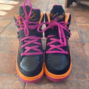 Jordan Nike black and orange tennis shoes